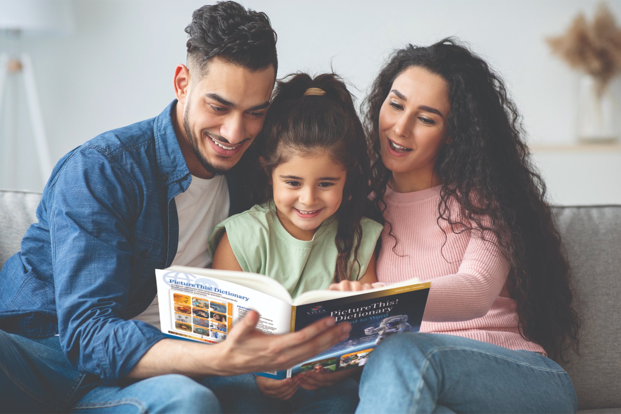 Family reading the PictureThis! Dictionary together at home